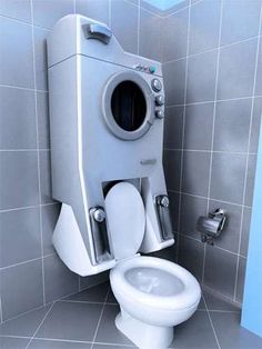 a white toilet sitting inside of a bathroom next to a trash can and roll dispenser