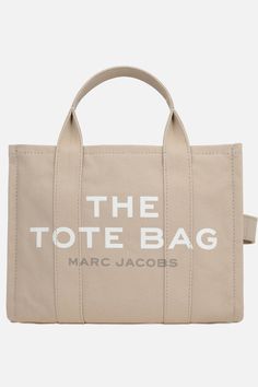 Marc Jacobs' tote bag crafted in beige canvas with screen printed logo. Featuring silver-tone hardware, internal zip closure, double handle and adjustable / removable fabric shoulder strap. Beige unlined interior with zip pocket and two flat pockets.Gender: WomenMaterial: 100% COTTONColor: BeigeMade in: VNProduct ID: M0016161260*Import tax/duty will be calculated at checkout (If applicable) Canvas Shoulder Bag With Logo For Errands, Beige Logo Shoulder Bag For Everyday Use, Canvas Logo Bag For Errands, Beige Logo Shoulder Bag For Errands, Logo Tote Bag For Errands, Beige Top Handle Shoulder Bag With Logo, Beige Logo Bags For Errands, Canvas Logo Bags For Errands, Travel Canvas Shoulder Bag With Logo