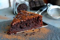 a piece of chocolate cake sitting on top of a table