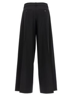 Low Rise Pleated cool wool pants with central pleats and pleat, a zip hookandeye and button closure, pockets. Composition: 96% wool, 4% elastaneComposition: 96% Wool, 4% Elastane Wide-leg Wool Pants With Pressed Crease, Tailored Wool Wide-leg Pants, Wool Wide-leg Pants With Pressed Crease, Business Wool Wide-leg Pants, Wide Leg Wool Bottoms For Business, Fitted Wool Pleated Bottoms, Tailored Wide-leg Pants For Business, Tailored Wide-leg Business Pants, Elegant Pleated Wool Bottoms