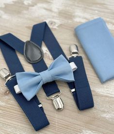 Your special guy will look so handsome when he shows up in his Steel Blue bow tie, pocket square and Navy suspenders!  Great set for groomsman, best man or ring bearers - This bow tie & suspenders set is a great choice for family photos, wedding, ring bearer outfit, birthday celebration or any other special occasion.  When making a purchase, you can choose from the following options : -Suspenders Only -Bow Tie Only. -Suspenders + Bow Tie Set. - Pocket Square only. -3 Pieces Set : bow tie + suspe Rustic Wedding Outfit, Outfit Boho, Outfit Birthday, Bearer Outfit, Bowtie And Suspenders, Ring Bearers, Ring Bearer Outfit, Blue Bow Tie, Groomsman Gift