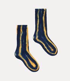 Our Ladies' socks in soft cotton feature an embroidered orb on the ankle, a motif created by Vivienne Westwood in the 1980s to symbolise taking tradition into the future. The design features our all-over striped artwork, which resembles our archival shirts. Striped Artwork, Ladies Socks, Into The Future, Socks And Tights, Knitwear Tops, Shirt Skirt, Corset Dress, Orange And Purple, Vivienne Westwood