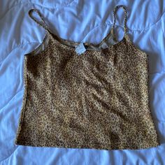 Cheetah Print Cropped Tank Top In Perfect Condition (Bnwt No Flaws) Juniors Size Xl Ask Any Questions... I Am Always Open To Offers... Be Sure To Check Out My Closet For Similar Items... Casual Fitted Top With Tiger Print, Stretch Tiger Print Top For Summer, Brown Tiger Print Top For Spring, Brown Tiger Print Tops For Spring, Spring Brown Tiger Print Tops, Candy Brown, Concert Outfits, Pinterest Closet, Birthday Wishlist