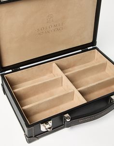 Grained calfskin glasses organizer Perfect for storing your glasses while traveling or at home, this glasses box is an elegant accessory made of grained calfskin in the season’s special delicate color. The interior is lined in soft suede and features six compartments for storing glasses. The branded handle and the double closure allow for safely carrying and storing your eyewear. Tuxedo T Shirt, Leather Glasses Case, Boutique Online, Eyewear Womens, Best Bags, Elegant Accessories, Glasses Case, Soft Suede, Brunello Cucinelli