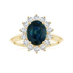 a yellow gold ring with an oval blue sapphire surrounded by white diamonds