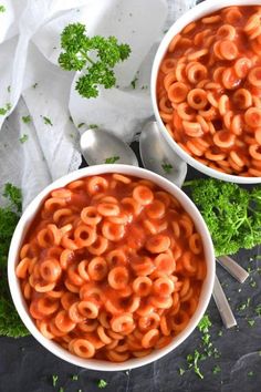 two bowls of homemade copycati spaghetti with parsley on the side and title overlay