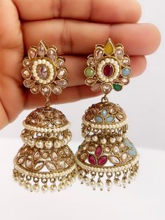 Restocked Antique Polki kundan Jhumka/stone Jhumka/Indian Jewelry/Pakistani Jewelry/Punjabi Jewelry/Statement earring/Bridal earring wedding This is 100% Handmade jewelry. So Color, shades, texture displayed may slightly vary from the actual product due to digital image limitations. We request you to consider these minor variations. Please expect the possibility of some slight imperfections when buying hand made jewelry. If you have any questions, please message or email us. Arrives in a gift bo Festive Chandbali Earrings With Tilla Detail, Tilla Chandbali Earrings For Celebration, Festive Chandbali Earrings With Tilla, Festive Tilla Chandbali Earrings, Bollywood Style Chandbali Jhumkas For Festive Occasions, Heavy Bollywood Jhumkas For Festivals, Kundan Jhumkas With Tilla For Diwali, Kundan Chandbalis For Navratri, Traditional Kundan Jhumkas For Festive Occasions