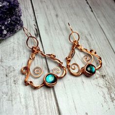 These Whimsical Copper Earrings Feature Genuine Semiprecious Labradorite Crystals And Lots Of Enchanting Copper Swirls Winding All Throughout Artisan Designed Hand Wire Wrapped With Bare Copper Wire Which Will Patina Over Time Comes With Hypoallergenic Hand Crafted Copper Hooks Length Is About 2” Comes Gift Boxed Great Gift Idea For Birthdays / Mother’s Day Anniversary / Holidays Or Just Because These Whimsical Beauties Definitely Have That Boho Vibe *Smoke Free *Pet Friendly Studio Want To Save Copper Earrings Handmade, Work Earrings, Jade Crystal, Wire Work Jewelry, Unusual Jewelry, Work Jewelry, Wire Wrapped Earrings, Wrapped Jewelry, Artisan Design