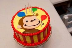 a birthday cake with a monkey face on it