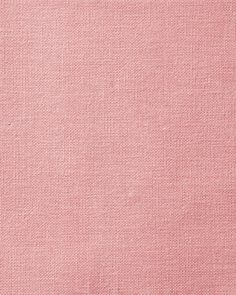 a close up view of a pink fabric texture