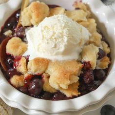 a bowl filled with fruit and ice cream