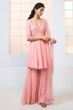 Peach peplum kurta with resham, beads and sequin floral pattern embroidery. Comes with sharara and scatter embroidered dupatta. - Aza Fashions Designer Chikankari Embroidery Peplum Dress, Eid Peplum Dress With Chikankari Embroidery, Festive Chikankari Embroidered Peplum Dress, Wedding Sharara With Chikankari Embroidery And Peplum Style, Eid Chikankari Embroidery Peplum Dress, Designer Wear Peplum Sharara With Chikankari Embroidery, Designer Peplum Salwar Kameez, Designer Sharara With Chikankari Embroidery, Semi-stitched Peplum Anarkali Set For Wedding