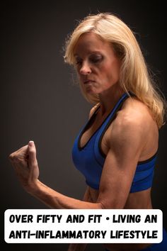 a woman flexing her muscles with the words over fifty and fit - living an anti - flamatory lifestyle