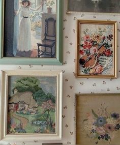 there are many pictures on the wall with flowers and lady's house in them