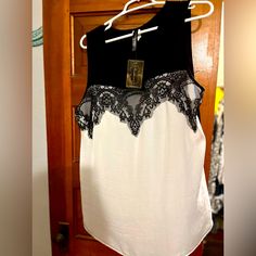 Loose And Float Tank That Stretches. In Perfect Condition With Tags, Never Worn White Lace Trim Top For Night Out, Elegant Black And White Top For Summer, Elegant Black And White Summer Top, Purple Tube Top, Float Tank, Trapeze Top, Zara Tank Top, Lululemon Align Tank, Velvet Tank Top