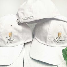 These custom champagne print baseball hats are perfect for a classy bachelorette, bridal shower, girls trip, birthday, or other bubbly, boozy celebration. Personalize each hat with a name or location in modern script lettering.  Optional - add 1-2 lines of custom text to the back of each hat.  𝗣𝗘𝗥𝗦𝗢𝗡𝗔𝗟𝗜𝗭𝗔𝗧𝗜𝗢𝗡 * Add  a name or location (printed in script - up to 12 characters maximum) 𝗢𝗣𝗧𝗜𝗢𝗡𝗔𝗟: Add 1-2 lines of short custom text to each hat 3.00 per hat)  (printed in ALL CA White Trucker Baseball Cap For Party, White Adjustable Hat For Bachelorette Party, White Snapback Party Hat, White Snapback Hat For Party, Adjustable White Mini Hats For Bachelorette Party, Adjustable Baseball Cap With Curved Brim For Party, White Adjustable Baseball Cap For Party, White Adjustable Snapback Hat For Birthday, Adjustable White Hats For Graduation