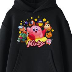 Take a trip to Dreamland with this Kirby sweatshirt. The hoodie features Kirby riding on a warp star while characters and icons from the games surround him. Pink letters below the image spell out Kirby's name. The sweatshirt comes in black with a double-lined hood and a large pouch pocket. Kirby fans will love this comfy hoodie. Pop Culture Hooded Sweatshirt With Character Print, Pop Culture Cartoon Print Sweatshirt For Winter, Winter Pop Culture Sweatshirt With Cartoon Print, Pop Culture Winter Sweatshirt With Character Print, Pop Culture Hooded Sweatshirt Fan Merchandise, Pop Culture Graphic Print Hooded Top, Character Print Hoodie Sweatshirt For Fans, Character Print Fan Merchandise Hoodie, Pop Culture Graphic Print Hoodie