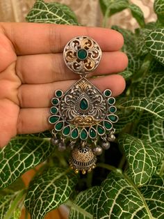 Gorgeous chandbali-jhumka design in pure brass (90%) and pure silver (10%) in two tone / dual tone / silver gold finish. Very beautiful design and craftsmanship. Available in red, blue, green, clear and multicolor stones. Care Instruction: Avoid heat & substances like perfume, deodorant, alcohol, etc and clean with silver/gold polish cloth. Store in airtight spaces like ziplock pouch or jewelry box. Dual-tone Chandbali Jhumkas As Gift, Dual-tone Chandbali Fusion Jhumkas, Fusion Dual-tone Chandbali Jhumkas, Dual-tone Chandbali Metal Earrings, Dual-tone Brass Chandbali Jewelry, Jhumka Design, Earrings Chandbali, Jhumka Designs, Cloth Store