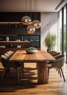 a dining room table with chairs and lights hanging from it's ceiling, in front of a large window