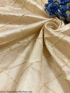 "This is a stunning silk! Silk dupioni in ivory, with beautiful small diagonal pintucks! This solid silk in ivory has a soft drape, stiffened only with the tucks, and would work well for a vintage dress, 18th century petticoat, vests, and many other things! There's a total of 1-3/4 yards available. If you want it all, message me, and I'll make you a reserved listing! This silk has slubs, consistent with traditional dupioni and shantung fabric. This would make amazing vintage inspired and modern gowns! Although this is silk, it is not historically accurate for time periods pre-1940. 54\" Wide; 100% Silk Lightweight with body *Please note that my Etsy shop closes every Friday evening till Saturday evening for Sabbath. Thank you for your understanding! Don't forget to check out all the other 18th Century Petticoat, Modern Gowns, Princess Ariel Dress, Dupioni Silk Fabric, Modern Gown, Silk Dupioni, Time Periods, Dress Weights, Dupioni Silk