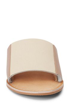 Colorblocking is always cool as this sun-ready sandal attests with a two-tone strap crafted from smooth leather. Leather upper and lining/synthetic sole Imported Leather Slides For Beach In Summer, Leather Slides For Summer Beach, Leather Slides For Summer Beach Outings, Summer Beige Sandals With Adjustable Strap, Beige Leather Mules With Cushioned Footbed, Cream Sandals With Leather Footbed For Spring, Summer Leather Beige Mules, Beige Leather Slip-on Sandals, Summer Beige Leather Mules