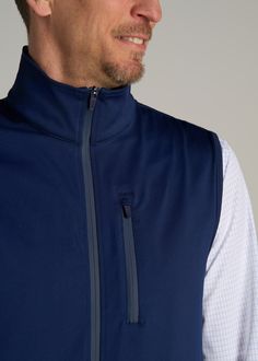 Enhance Your Performance: The Ultimate Tall Men's Vest Where Style Meets Performance Step up your game with our Performance Vest, engineered for the tall man who demands both style and functionality. More than a tall men's jacket, this vest features stretch fabric for freedom of movement, a zippered closure for ease, and a sleek design that looks as good as it feels. Whether you're on a morning run or out on the town, this tall men's vest has got you covered.• Stretch fabric for optimal mobility Scrubs Dress, Cozy Sleepwear, Tall Man, Morning Run, Tall Men, Vests Mens, Men's Vest, Sports Blazer, Women Essentials