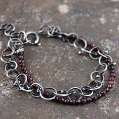 "Garnet silver chain bracelet. Dimensions: -stones 0.3 cm, 0.12\" -diameter of chain links approx 0.8 cm, 0.32\" -circuit 16 - 18 cm, 6.3 - 7.1\"" Silver Cable Chain Metal Bracelets, Silver Cable Chain Sterling Silver Bracelet, Sterling Silver Cable Chain Bracelet In Silver, Sterling Silver Bracelet With Cable Chain In Silver, Bohemian Silver Chain Bracelet With Adjustable Chain, Sterling Silver Link Chain Bracelet With Adjustable Chain, Bohemian Bracelet With Silver Chain, Bohemian Silver Chain Bracelet, Sterling Silver Link Chain Bracelets