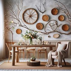 a dining room table with chairs and plates on the wall above it, surrounded by branches