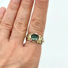 D E T A I L S :Watery Blue Tourmaline Flower Ring with Vintage Band, One of a Kind RingGemstones: 1.85 ct Brazilian Tricolor TourmalineMetal: 14K solid yellow gold, 14K solid white and rose gold accentsBand Width: 9mmSize: Sizable from about 6.5-8 (please allow 2 weeks for sizing)One of a kind JewelryHandmade by Jen in the USA ______________ FINE JEWELRY THAT IS ONE OF A KIND - JUST LIKE YOU: This is a very special ring. There’s nothing like vintage jewelry and fashion, and I have an INCREDIBLE Multi-stone Tourmaline Sapphire Ring For Anniversary, Unique Yellow Gold Sapphire Ring With Accent Stones, Multi-stone Tourmaline Gemstones For Anniversary, Anniversary Tourmaline Jewelry With Bezel Setting, Fine Jewelry Tourmaline Rings With Gemstone Accents, Anniversary Sapphire Ring With Tourmaline Gemstone Accents, Tourmaline Birthstone Ring In Yellow Gold, Unique Yellow Gold Emerald Ring With Accent Stones, Yellow Gold Tourmaline Birthstone Ring