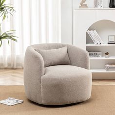 a living room with a chair and bookshelf