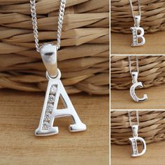 This is solid 925 sterling silver letter initials with cubic zirconia.     925 stamped. Approx. measure :     total length: 18mm.     without bail: 12mm.    width: from 8mm. to 12mm. according to the shape of letter. Approx. weight:      from 1.2gr. to 1.8gr. depends on letter Presented in gift box. Thank you for looking! Silver Diamond Initial Necklace For Gift, Silver Cubic Zirconia Initial Necklace For Gift, Personalized Silver Initial Necklace With Cubic Zirconia, Silver Cubic Zirconia Initial Necklace, Silver Diamond Initial Pendant Necklace, Sterling Silver Initial Necklace With Diamond Accents For Anniversary, Silver Initial Necklace With Diamond Accents For Anniversary, Sterling Silver Hallmarked Initial Necklace For Anniversary, Anniversary Sterling Silver Initial Necklace With Diamond Accents