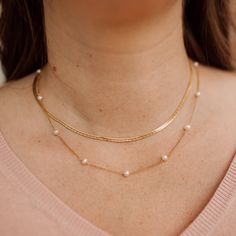 A modern take on a classic pearl strand! Marie is a beauty worn alone, but layers perfectly with other designs. We love pairing her with the Janis chain! Handcrafted in our Salt Lake City studio ✨ DETAILS Made in 14k gold filled with a durable, easy to use lobster clasp. Each natural, freshwater pearl measures about 4mm across. Goddess Attire, Pearl Chain Necklace, Pearl Strand, Pearl Strands, Studio City, Pearl Chain, Salt Lake City, Lake City, Minimalist Jewelry