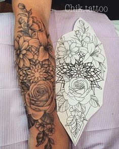 a woman's arm with flowers on it next to a tattoo that has been drawn