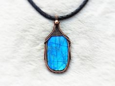 "Sleek Labradorite Pendant Necklace created with Wire Wrapping. Copper Crystal Wire Wrapped Pendant, Protection Necklace Witchy Jewelry Unique Handmade Artisan Jewelry !! Original Designs by ArtsvilleHandcrafted The pendant is made from pure copper wires and Labradorite stone combination.. Wear this necklace for the healing properties of this amazing stone.    Select Necklace Length of your choice !! All Jewelry is nicely packed and dispatched within 1-2 working Days. I love to create beautiful Witchy Protection, Crystal Wire Wrap, Rudraksha Jewelry, Copper Crystal, Witchy Jewelry, Protection Necklace, Jewelry Unique, Labradorite Pendant, Labradorite Stone