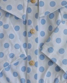 Cute marks the spot. The adorable Cleo Baby Blue Polka Dot Dog Shirt is a staple for your furball. Baby blue dots cover this crisp white button-up, with sweet short-sleeves and an elastic undercarriage for the perfect fit. Wood buttons line the polka dot placket for a casual look. Comfort meets cute, and fashion meets fur. - Allover blue polka dot print- 100% cotton- Machine wash cold, dry flat- Designed in California- Imported, FURB exclusive Light Cyan, Dot Shirt, Blue Dots, Wood Buttons, Polka Dot Shirt, White Button Up, Blue Dot, Blue Polka Dots, The Spot