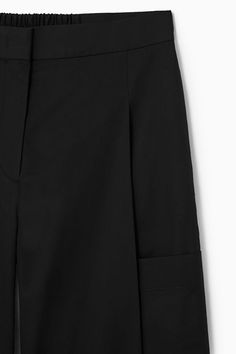 ELASTICATED PLEATED CULOTTES - Black - COS Wide Leg Pleated Culottes For Work, Pleated Wide Leg Culottes For Work, Knee-length Pleated Waist Bottoms For Work, Wide Leg Pants With Pockets For Office, Casual Workwear Bottoms With Box Pleat, Pleated Wide-leg Culottes For Work, Pleated Wide-leg Workwear Culottes, Chic Wide Leg Work Pants With Patch Pockets, Chic Wide Leg Pants For Workwear With Patch Pockets