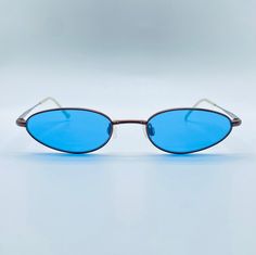 Lacoste mod. LD 8016 E011 F827 / 80s / Vintage Slim Brown Cateye Sunglasses /Tinted Blue Lenses /   Mens & Womens Frame / Made İn France ✓ BRAND: Lacoste ✓ Made in France ✓ YEAR: 80's ✓ MODEL: LD 8016 E011 F827 ✓ CONDITION: NOS #  NEW OLD STOCK (Never Worn Before) ✓ SIZE : 47- 19 #WIDE ACROSS THE FRONT: 130 mm / 5.11 inch #VERTICAL HEIGHT OF THE FRAME: 27 mm /1.06 inch #TEMPLE: 135 mm / 5.31 inch ✓ MATERIAL #FRAME: Metal #LENSES:  Organic Lenses UV 400 Protected  ✓ COMMENT All of our products are vintage eyewear which is new old stock (NOS) and these items have never been worn. We're delivering our products in small boxes with a cleaning cloth. Retro Blue Cat Eye Sunglasses, Blue Tinted Glasses, Tinted Glasses, Cateye Sunglasses, Vintage Eyewear, Blue Lenses, Eye Wear Glasses, 80s Vintage, Steel Necklace