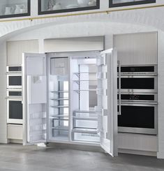 an open refrigerator with its doors wide open