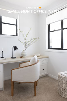 a home office with white furniture and large windows