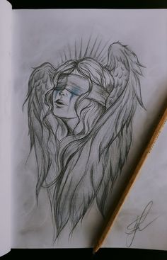 a pencil drawing of a woman's face with wings on her head and eyes closed