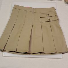 Khaki Skirts With Shorts Inside. Multiple Sizes French Toast Uniforms, French Toast School Uniforms, Navy Pleated Skirt, School Uniform Skirts, Hat Jewelry, Dpr Ian, Kids Uniforms, Khaki Skirt, Ruffle Mini Skirt