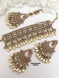 Antique Gold Polki choker Set comes with elegant earrings and tikka / Indian Jewelry/ High Quality Kundan and Polki Jewelry/ Bollywood Jewelry/Wedding Jewelry   All items are shipped from Brampton, Ontario, Canada. If you need your item by a certain day, please reach out to us for express delivery option before placing the order so that we can update the shipping for you. Standard shipping/delivery timeline Below are the delivery timeline estimates once the order ia shipped ---> USA delivery timeline * 3-5 business days to major urban centers in USA. It may take 1-2 days extra to remote locations ---> Canada delivery timeline  * 2-3 business days - GTA  & Montreal  * 2-4  business days - Rest of Ontario/Quebec * 3-6 business days-  Rest of Canada    ---> Europe/Middle East timeline * 5-10 Wedding Kundan Choker With Latkans, Kundan Choker With Latkans For Wedding, Bollywood Style Jewelry Sets For Reception, Wedding Choker With Latkans For Diwali, Bollywood Heavy Choker For Wedding, Heavy Wedding Choker Sets, Polki Choker Set, Polki Choker, Brampton Ontario