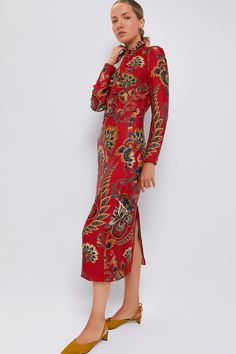 A seamless blend of tradition and modernityDiscover the enchanting allure of the Red Floral Cutout Long Sleeve Midi Dress. The high neckline gracefully flatters, while an unexpected back cutout infuses a graceful touch. The lush, botanical print is seasonless is design, making it a perfect year-round event dress with heels and a gold clutch!Our Favorite Details: High neckline Back button closure Open back Front keyhole Material: 100% ViscoseCare: Machine wash, gentle cycleAbout the BrandFarm Rio Fitted Red Midi Dress For Festive Occasions, Festive Red Evening Midi Dress, Fitted Red Midi Dress For Festive Season, Fitted Red Maxi Dress For Festive Occasions, Festive Red Fitted Midi Dress, Festive Red Midi Evening Dress, Festive Fitted Red Maxi Dress, Festive Red Midi Dress With Long Sleeves, Festive Red Fitted Maxi Dress