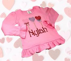 This personalized embroidered lollipop shirt is perfect for your sweet little girl! It is 100% cotton and 100% cute! It comes in sizes 12month to 6 in your choice of pink or red. Don't miss the opportunity for your sweetheart to display all this cuteness! Girls Shirt, Boys Clothes Style, Personalized Embroidered, Embroidered Shirt, Personalized Shirts, Lollipop, Shirts For Girls