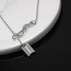 Indulge in luxury with our BTS Slider Necklace, featuring an intricate gate-shaped pendant on a sliding chain. The 87S spelling adds a touch of exclusivity to this elegant piece. Slider Necklace, Silver Necklaces, Sliders, Gate, Gold Necklace, Gift Card, Bts, Chain, Pendant