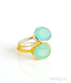 "You'll fall in love with the pastel seafoam green coloring of this Aqua Chalcedony ring. This is a perfectly sized oval to compliment any collection. Popular as a birthday gift for those March babes and aquamarine lovers alike. This is a light, opaque blue-green gemstone with no flaws. This stone is beautifully faceted and bezel set in a 925 sterling silver band or plated with 18k vermeil gold. Gemstone is approximately 8 x 12mm. Band has 925 stamp on inside. Please note that each ring is handm Aqua Chalcedony Ring, Stackable Birthstone Rings, Green Gemstone Ring, March Birthstone Jewelry, Gold Vermeil Jewelry, Chalcedony Ring, Aqua Chalcedony, March Birthstone, Vermeil Jewelry