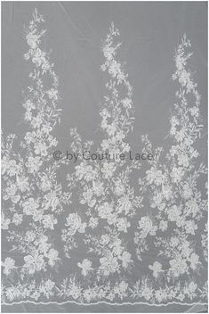 white lace with flowers on grey background for wedding dress, bridal gown or veil