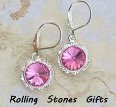 "These are Swarovski 12mm Rose Surrounds 925 Sterling Silver Leverback Earrings. These earrings measure 1 1/8\" high x 1/2\" wide. Order 1 pair or 100 pairs the shipping is a low flat for the entire order, in the U.S Rhinestones--Swarovski Crystal Leverbacks---Solid 925 Sterling Silver Settings-Sterling Silver Plated Earrings come carded and in our Gold Foil embossed cotton filled Gift Boxes From our different pics you can see how the same earring can appear different colors in different lightin Classic Pink Sterling Silver Earrings, Adjustable Lever Back Jewelry Gift, Adjustable Lever Back Jewelry As A Gift, Nickel-free Pink Sterling Silver Earrings, Pink Sterling Silver Earrings For Mother's Day, Silver Lever Back Jewelry Gift, Silver Lever Back Jewelry As Gift, Silver Lever Back Jewelry For Gift, Pink Lever Back Earrings For Anniversary