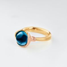 Modern Yellow Gold Blue Topaz Ring, Rose Gold Topaz Ring, Formal Rose Gold Ring With Blue Topaz, Rose Gold Ring With Blue Topaz, Rose Gold Rings With Blue Topaz, Fine Jewelry Rose Gold Ring With Blue Topaz, Rose Gold Blue Topaz Ring, Modern Gold Blue Topaz Ring, Formal Rose Gold Blue Topaz Ring