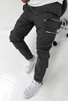 Urban Gray Cargo Pants With Pockets, Techwear Cargo Pants With Multiple Pockets, Baggy Cargo Pants With Zip Fly For Streetwear, Outdoor Cargo Pants With Zip Fly, Baggy Utility Cargo Pants With Zip Fly, Functional Tapered Leg Cargo Pants For Streetwear, Functional Tapered-leg Cargo Pants For Streetwear, Functional Tapered Leg Cargo Pants, Techwear Cargo Pants With Zip Fly